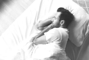 man sleeping snoring